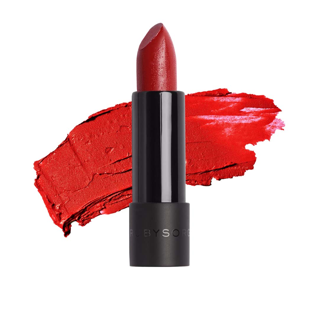 This is an image of Lipstick Brick from Ruby's Organics on SublimeLife.in. This lipstick moisturises and softens lips with ingredients like shea butter, almond and caster oils.